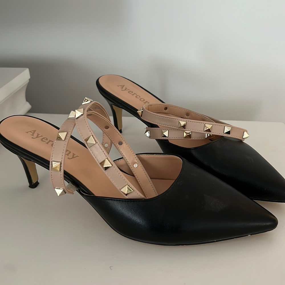 Black pump heels with tan studded ankle wraps